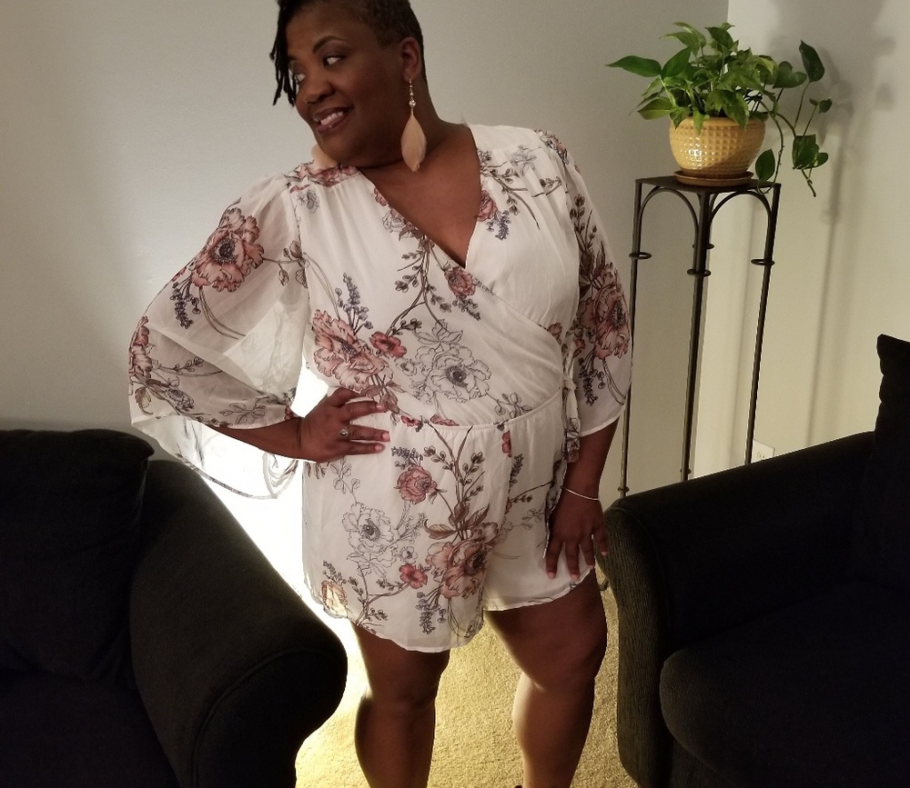 Elegant cream colored floral print romper